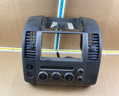 2005-2007 Nissan Pathfinder AC Heater Climate Control w/ Radio Bezel OEM - Image 1 of 4