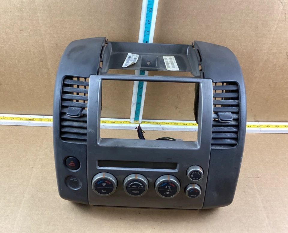 2005-2007 Nissan Pathfinder AC Heater Climate Control w/ Radio Bezel OEM - Image 1 of 4