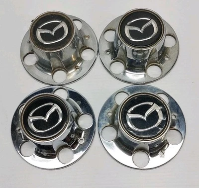 🤑 Juego de 4 tapas centrales para llantas de camioneta Mazda Navajo usadas originales #F87A-1A096-JB  Foto 1 de 4