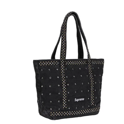 BOLSO DE MANO SUPREME SS25 BB.SIMON DENIM CON TACHUELAS PEDRERÍA CAMUFLAJE NEGRO ÍNDIGO Foto 1 de 4