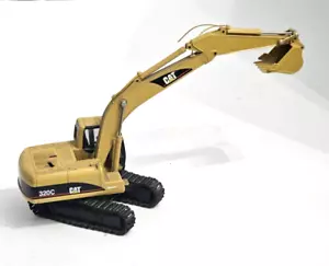 ANTIGUA EXCAVADORA FUNDIDA A PRESIÓN CAT CATERPILLAR 320C REGA JUGUETE ESCALA 1/40 - Imagen 1 de 13