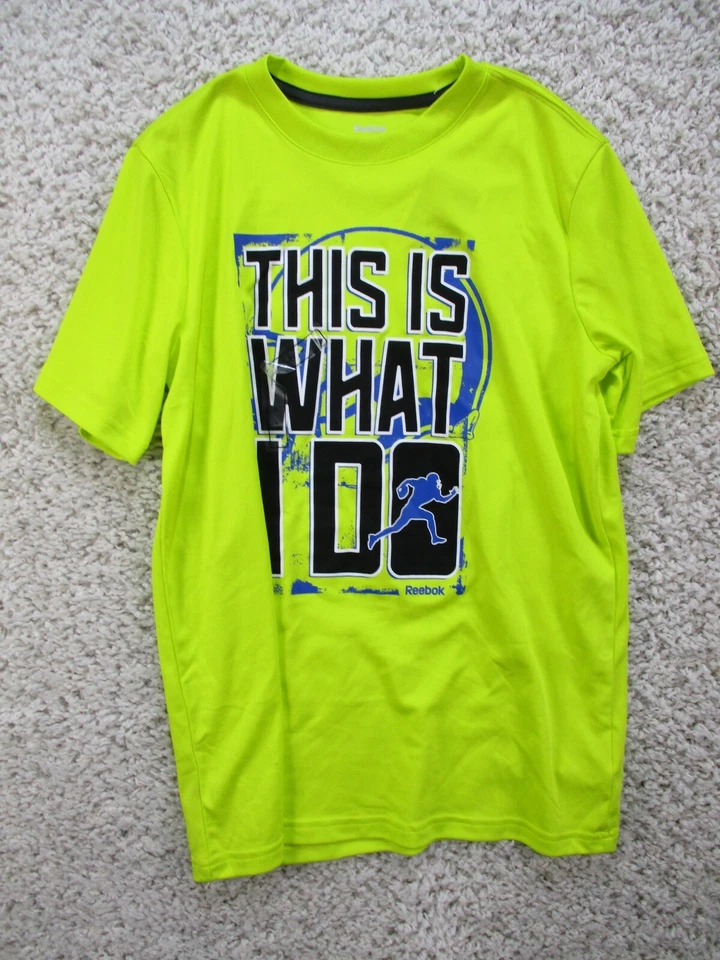 Camisa Reebok Niños Grande Amarilla Manga Corta Cuello Redondo Atlética Poliéster Camiseta Foto 1 de 4