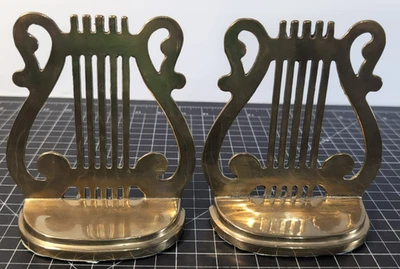 Par de sujetalibros vintage de arpa de latón con extremos de libro símbolo musical soporte de personal Foto 1 de 4