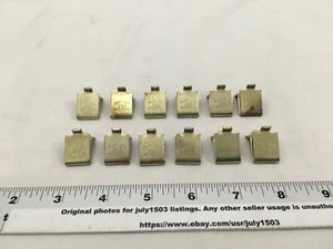 (12) Used Knape & Vogt 256 Shelf Support Clips - Brass - Picture 1 of 4
