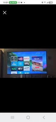 TCL Roku TV with TV Stand - Image 1 of 4