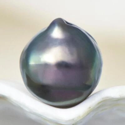 5.45 cts Tahitian South Sea Pearl 10.23mm Charcoal Black Baroque 1.09g undrilled - Image 1 of 4