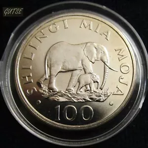 *GUTSE* TANZANIA, 100 SHILINGI 1986, ELEFANTE CON CRIA, SIN CIRCULAR. - Imagen 1 de 2