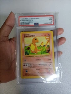 PSA 7 Charmander 46/102 - Juego base cuarta impresión 1999-2000 TCG DE COLECCIÓN WOTC - Imagen 1 de 8