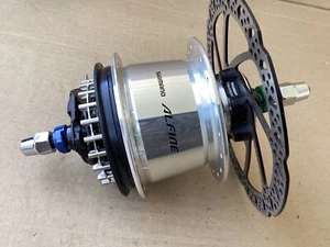 Shimano MOZZO INTERNO INGRANAGGIO DISCO 8 MARCE, SG-S7051-8, ALFINE Di2, 36H 135X187 - Foto 1 di 6