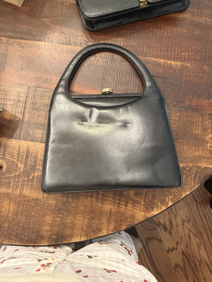Elegante bolso de mano vintage de cuero negro Foto 1 de 4
