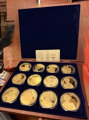 American Mint Portraits of a Queen Complete Commemorative 12 Piece Coin Set - Image 1 of 3