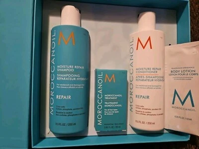Moroccanoil Moisture Repair Shampoo, Conditioner 8.5 oz & Treatment oil 0.85 oz - Image 1 of 2