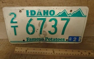 Idaho 1986 Nummernschild # 2T 6737 weiß mit grünem Schriftzug hat Hologramm - Bild 1 von 3