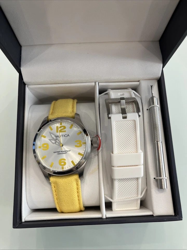 Reloj Nautica A11630M de lona amarilla con juego de correa de silicona blanca Foto 1 de 1