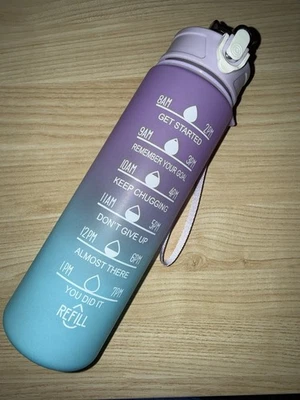 Botella de agua potable deportiva motivacional con marcador de tiempo 32 OZ púrpura libre de BPA Foto 1 de 4